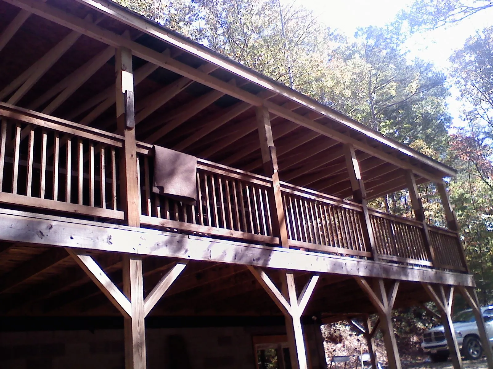 Timber framing under a new elevated porch and deck in Glen Allen